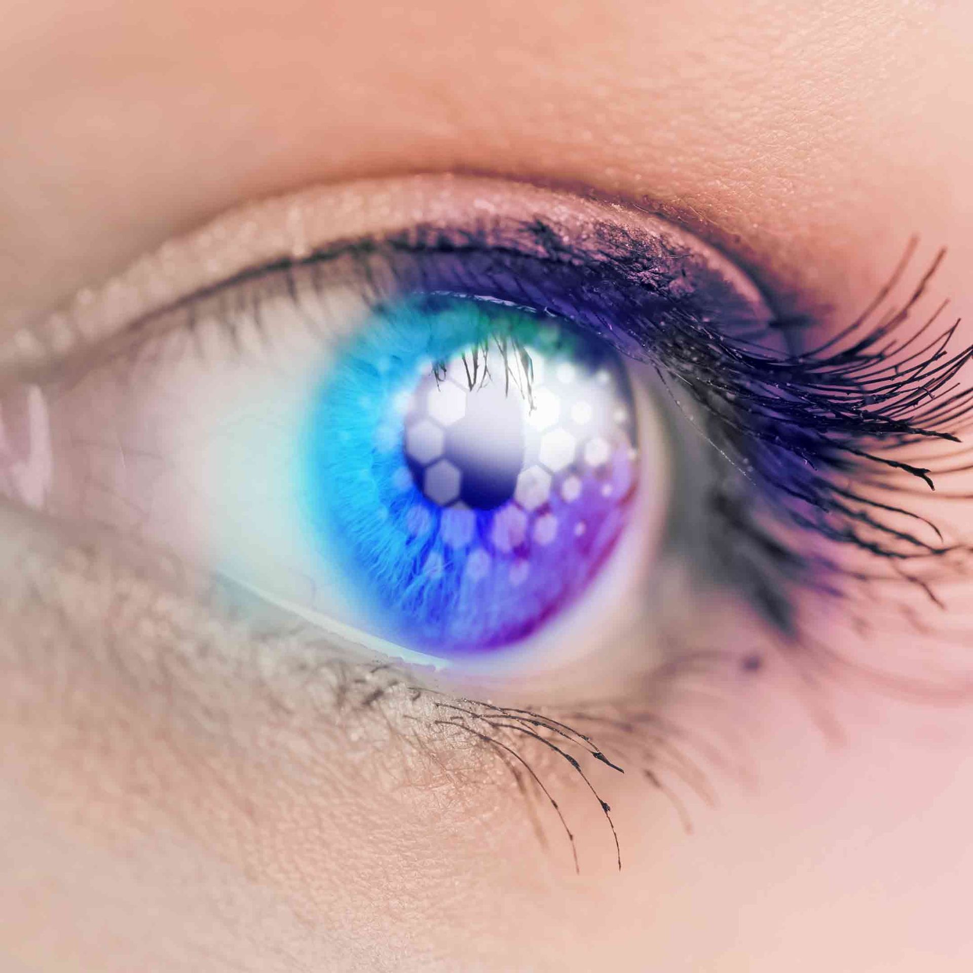 close up of a woman's eye with psychedelic coloring and a Sens.ai logo subtly overlaid